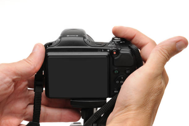 istock Digital photo camera on a white background 1183813423