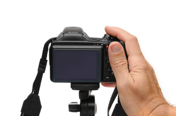 istock Digital photo camera on a white background 1183813443