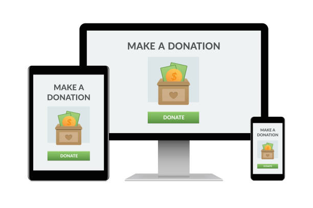 istock Donation concept on electronic devices isolated on white background 1183814517