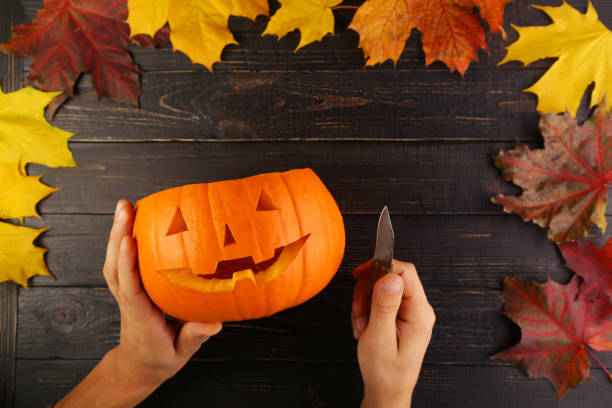 istock Halloween pumpkin carving 1183820020