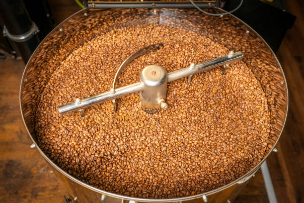 istock Mixing of roasted coffee 1183820248