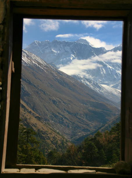 istock Mount Everest and valley, framed by a wooden window 1183822745