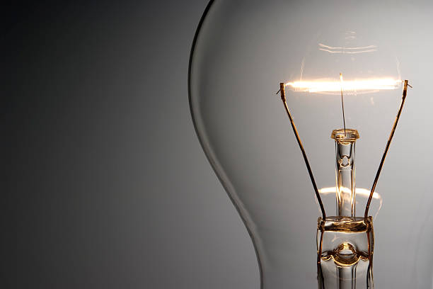 istock Close-up shot of illuminated light bulb with copy space 118382732