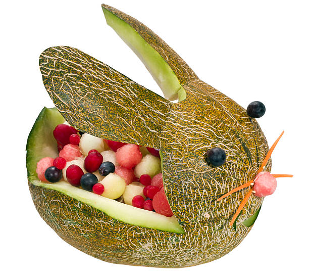Rabbit from melon  fruit carving stock pictures, royalty-free photos & images