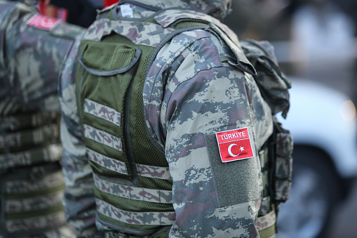 Turkish soldiers, holding MPT 76 assault rifles (7.62x51 mm NATO), take part at the Romanian National Day military parade