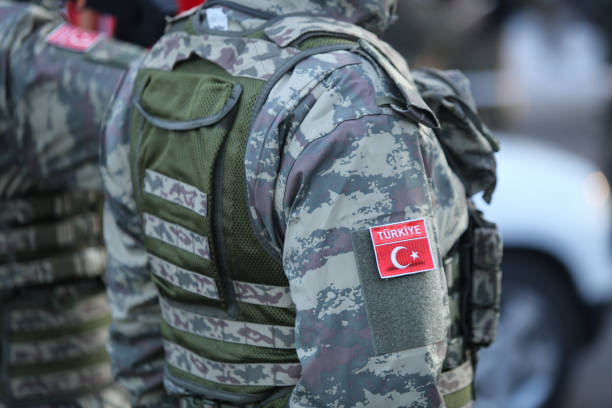 Turkish soldiers, holding MPT 76 assault rifles (7.62x51 mm NATO), take part at the Romanian National Day military parade Turkish soldiers, holding MPT 76 assault rifles (7.62x51 mm NATO), take part at the Romanian National Day military parade soldier stock pictures, royalty-free photos & images