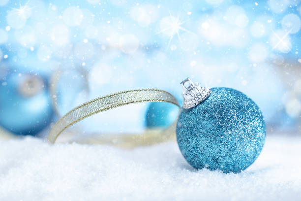istock christmas decoration with balls on snow 1183835307