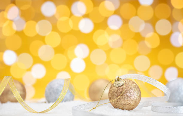 istock christmas decoration with balls on snow 1183835334