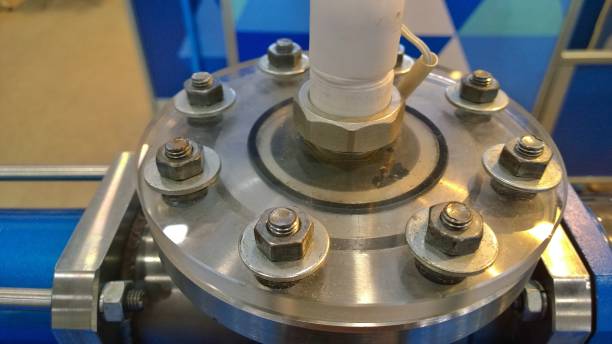 istock Assembly unit. Steel flange with hex nuts, washers and bolts. Design, technology and production in mechanical engineering. Industrial Products, Tools, equipment and device. Technology projects. 1183838252