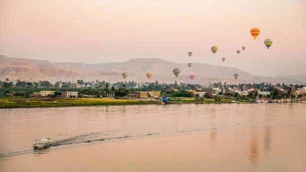 Hot air balloons Over the nile river in Luxor