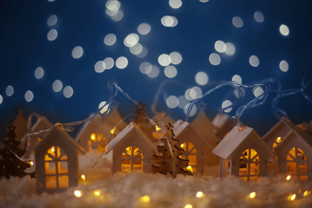 istock Glowing houses Christmas card 1183839468