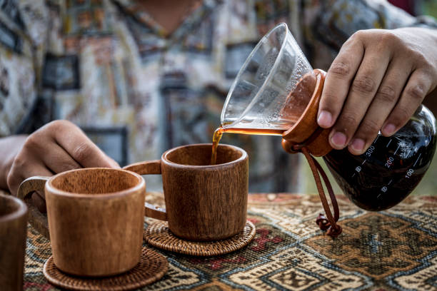 istock Coffee makers making coffee,drift,roasted coffee beans, hot drink 1183843859