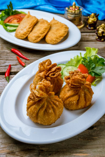 istock hoshour mongolian cuisine on wooden table 1183845012