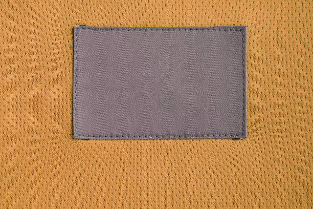 istock laundry care clothing label patch on polyester fabric jersey sport texture 1183845846