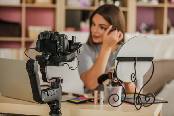 istock Beauty blogger filming a video for her audience 1183845917