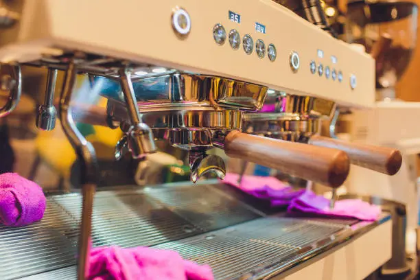 Close-up of an espresso machine making a cup of coffee