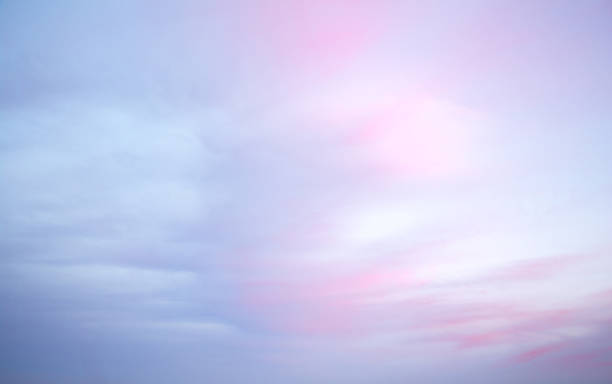 istock Colorful dawn/dusk sky, with pink and blue light clouds, background. 1183846535