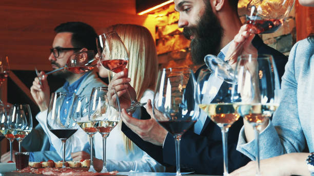 istock Friends tasting wine together 1183847325