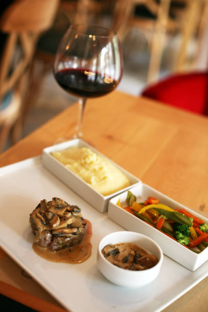 istock Beef with mushroom sauce, appetizer and red wine 1183847963