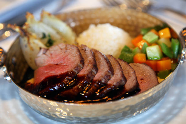 istock Rare lamp meat with vegetables and rice 1183848856