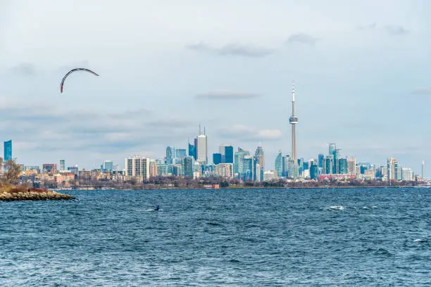 Kitesurfing in Ontario lake in winter day