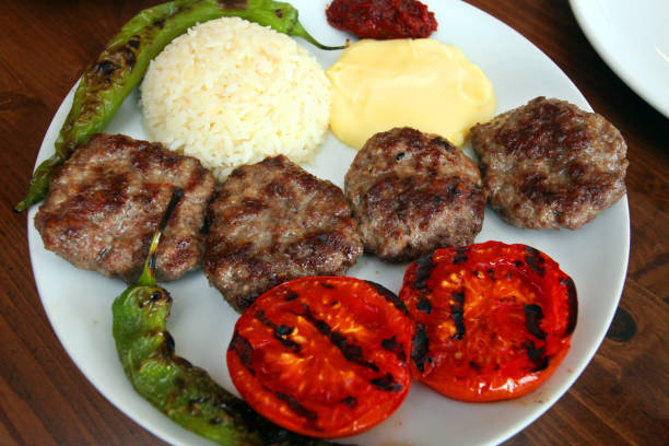 istock Meatballs with rice and vegetables 1183850282