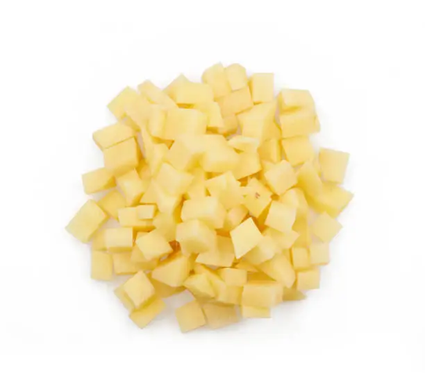 potato cubes isolated on white background.