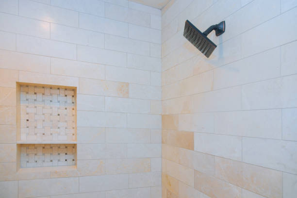 istock Close up on head shower running water drops flowing 1183857407