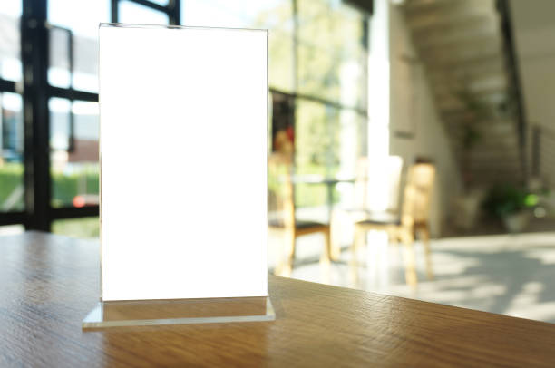 istock Menu frame standing on wood table in Bar restaurant cafe. space for text marketing promotion. 1183871309