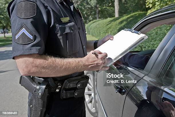 Speeding Ticket Stock Photo - Download Image Now - Police Force, Writing - Activity, Pulled Over by Police