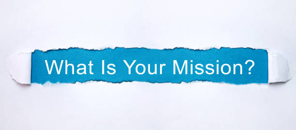 istock What Is Your Mission? text in torn paper. 1183887335