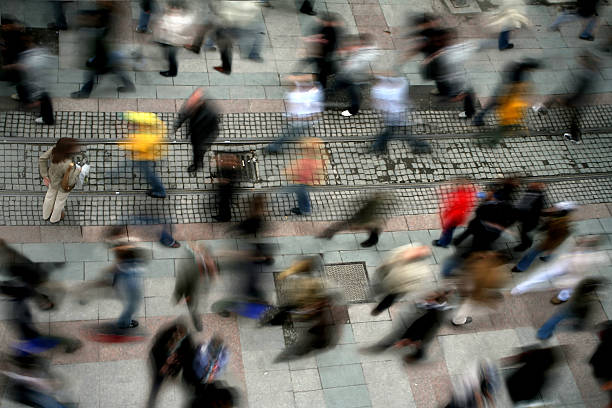 Blurred Motion people on busy street