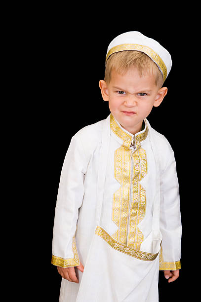 istock Adorable kid wearing an Arabic thobe 118389502