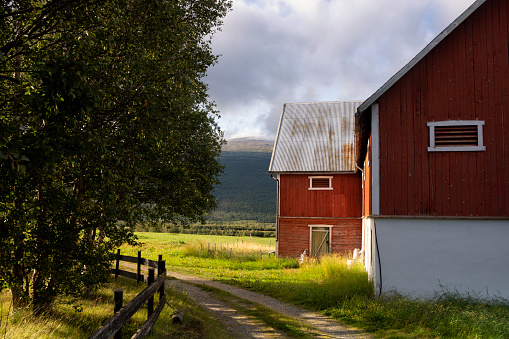 Falured painted farmbuilding near Lesja in the Norwegian region Gudbrandsdalen