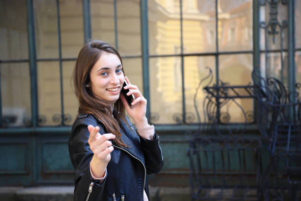 istock Young woman talking on the phone 1183895872