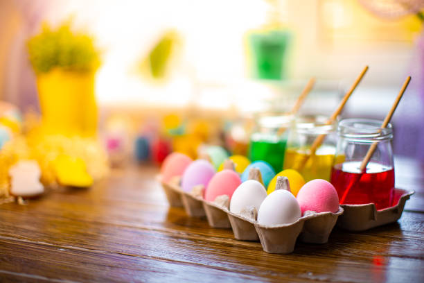 istock Happy Easter. Background with colorful eggs in basket. Table decorating for holiday 1183896192
