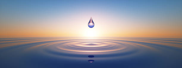 Water Drop in wide calm Ocean Water Drop in wide calm Ocean with ripples at sunset compatibility photos stock pictures, royalty-free photos & images