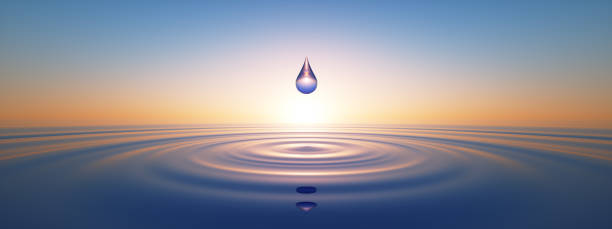 Water Drop in wide calm Ocean Water Drop in wide calm Ocean with ripples at sunset spiritual enlightenment stock pictures, royalty-free photos & images