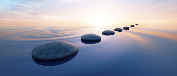 Pebbles in wide calm Ocean Row of stones in calm water in the wide ocean concept of meditation - 3D illustration buddhism stock pictures, royalty-free photos & images