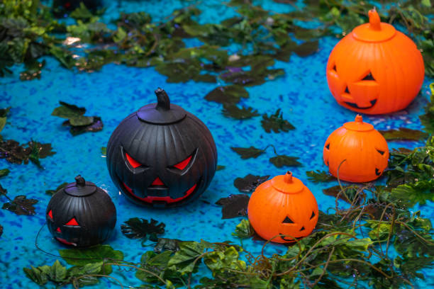 istock Orange and black colored jack o lanterns for Halloween concept 1183899974