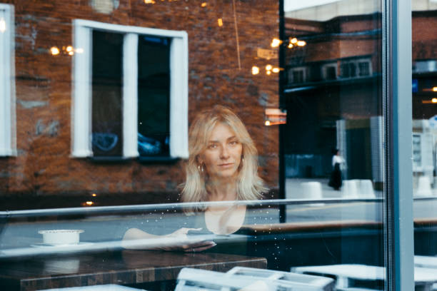 istock Businesswoman in a cafe 1183900391