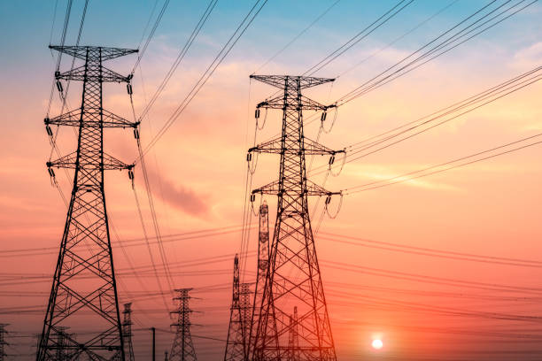 istock High voltage tower silhouette and sky landscape at dusk 1183904851