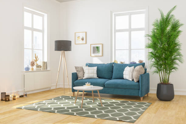 современный интерьер гостиной с удобным диваном - в стиле минимализма стоковые фото и изображения
