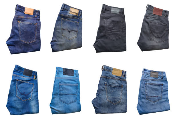 istock Collection of folded jeans trousers isolated on white background. 1183910316