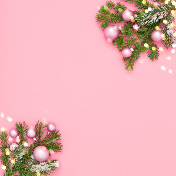 istock Christmas ornaments bokeh lights decoration pink background 1183911261