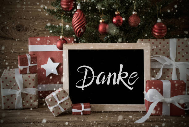 istock Christmas Tree, Snowflakes, Gift, Text Danke Means Thank You 1183911954