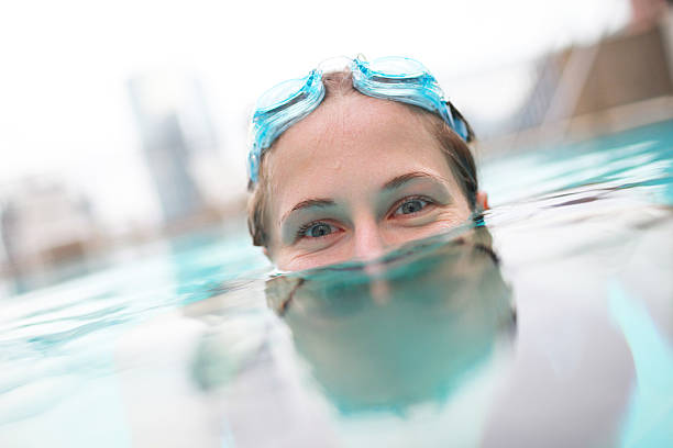 istock Woman swimming in pool 118391196