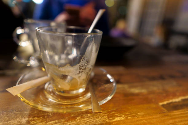 istock Empty glass mug after drinking coffee. close up 1183918508