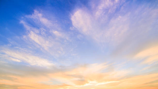 istock Aerial view dramatic sunset and sunrise sky nature background with white clouds 1183920086