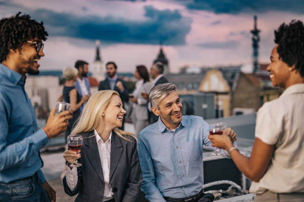 istock Cheerful managers having fun at the outdoor party. 1183921386